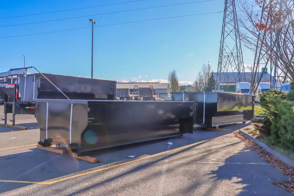 Roll-off dumpster ready for waste disposal at job site for 3 Yard Dumpster Rental in Middlesex